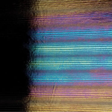 Bullseye 0100-0056 Svart. Dragspel. Iridiserande. Opak 2 mm.