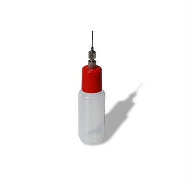 Plastflaska med färgat lock